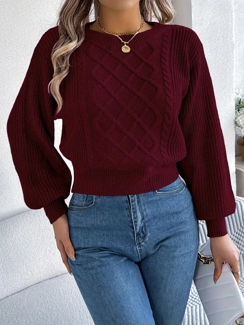 Sweter damski w kolorze burgundowym z warkoczowym splotem i luźnymi rękawami