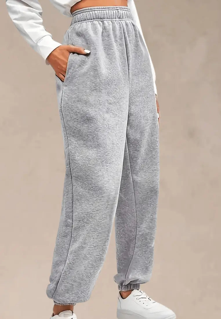 Szare spodnie dresowe damskie z gumką w pasie i ściągaczami u dołu