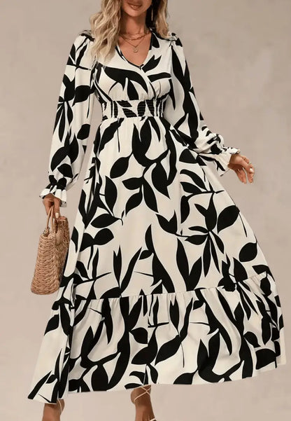 Beżowa sukienka maxi z czarnym wzorem liści i gumką w talii