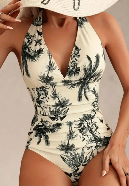 Kremowy strój kąpielowy jednoczęściowy damski z tropikalnym wzorem