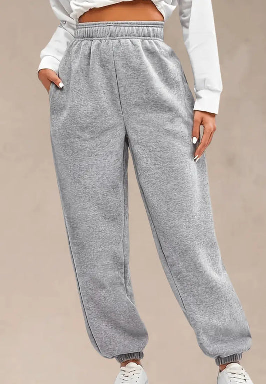 Szare spodnie dresowe damskie z gumką w pasie i ściągaczami u dołu