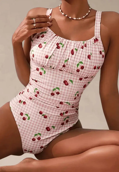 Różowy strój kąpielowy jednoczęściowy damski w kratkę z motywem wiśni