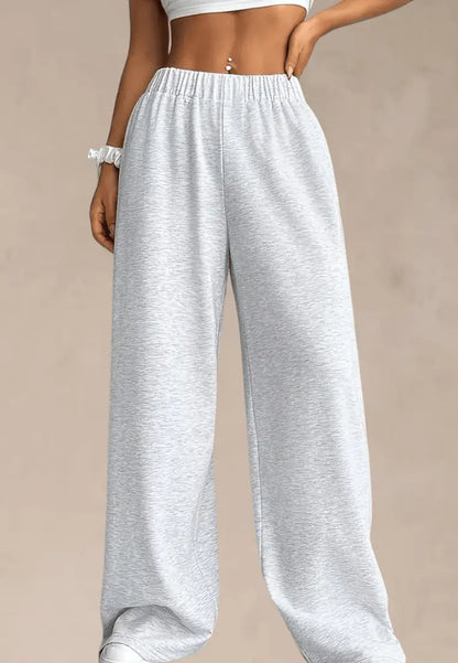 Szare spodnie dresowe damskie z szerokimi nogawkami i gumką w pasie