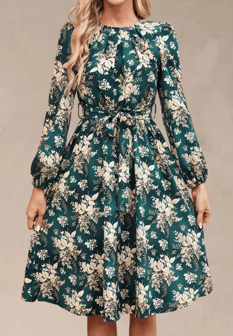 Zielona sukienka midi  w kwiaty z paskiem i długim rękawem