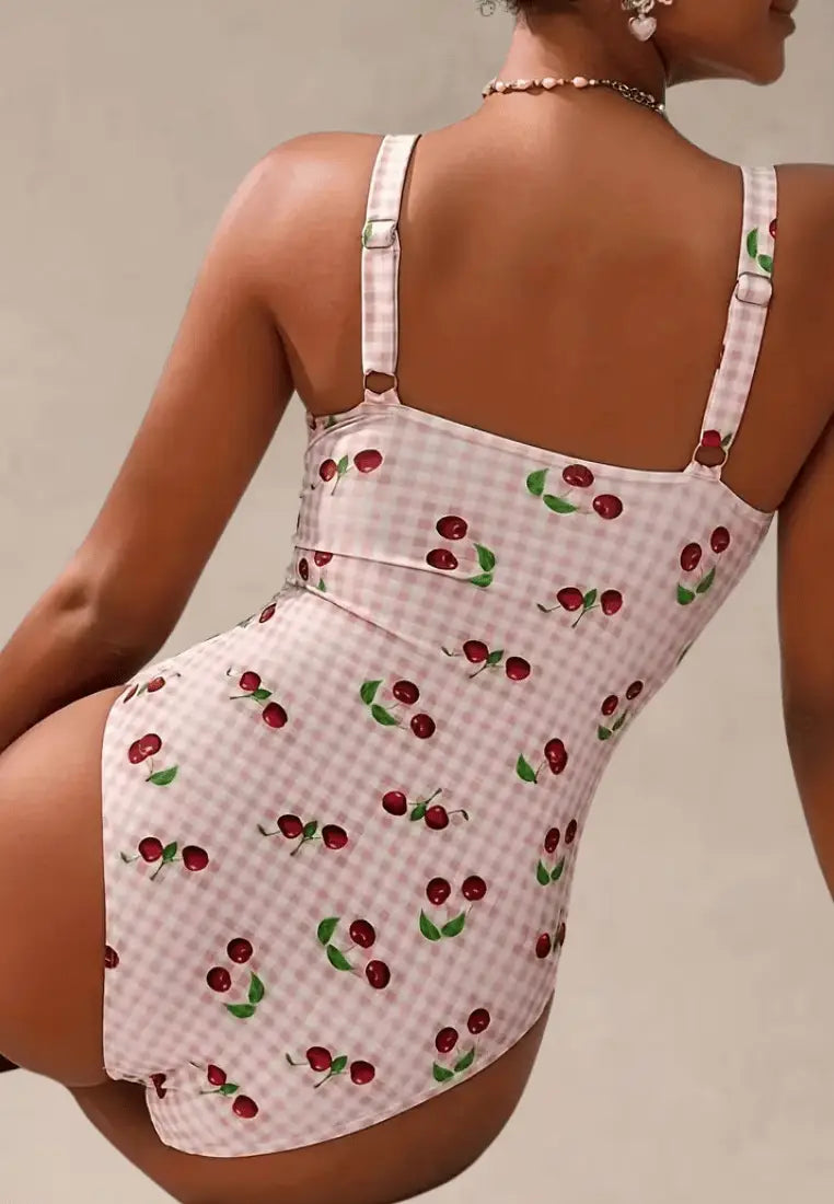 Różowy strój kąpielowy jednoczęściowy damski w kratkę z motywem wiśni