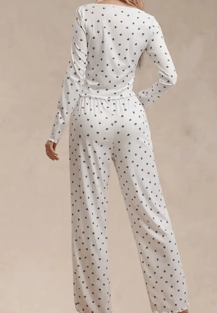 Biały komplet piżamowy damski z długim rękawem i spodniami w kokardki