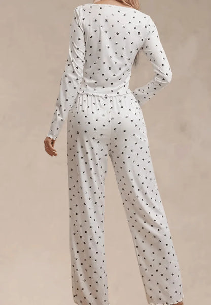 Biały komplet piżamowy damski z długim rękawem i spodniami w kokardki