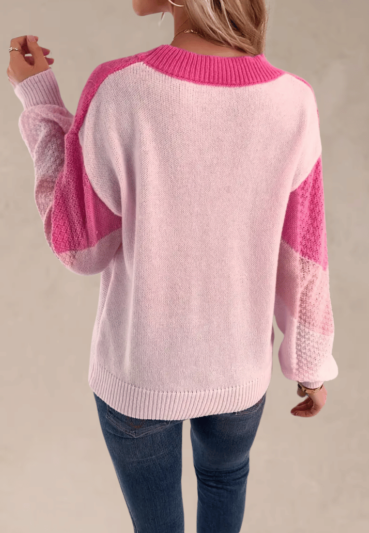 Różowy sweter damski z geometrycznym wzorem i okrągłym dekoltem
