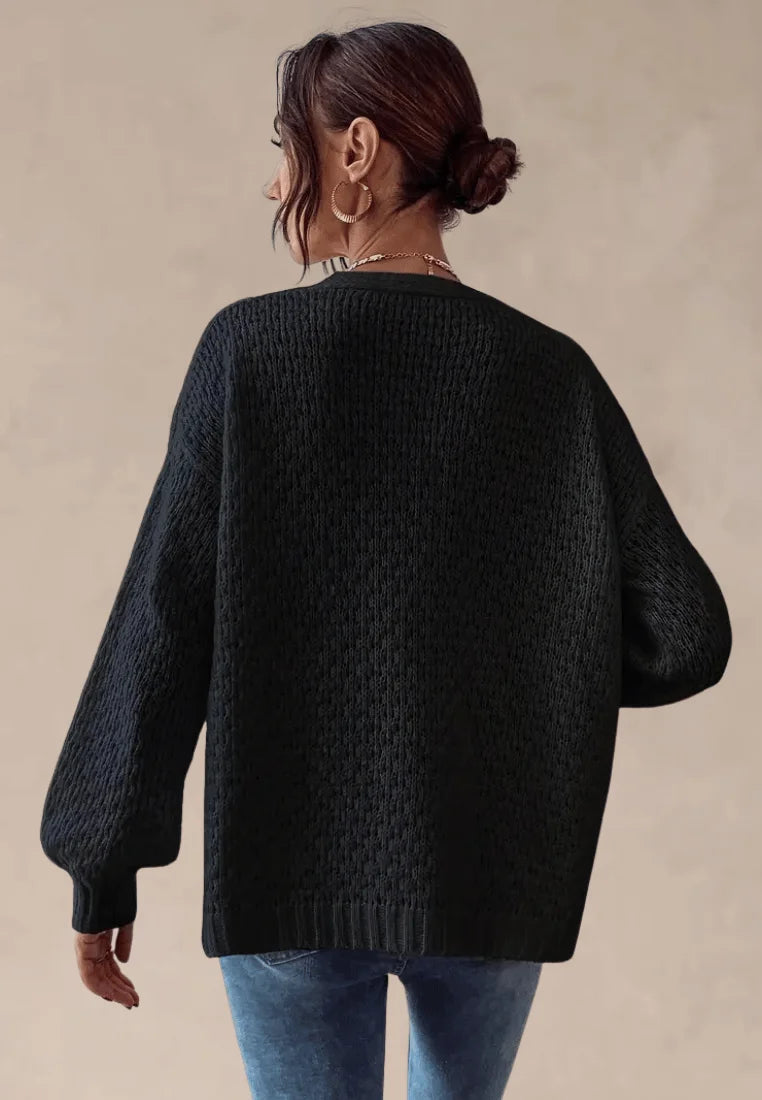 Czarny kardigan damski z kwiatami 3D bez zapięcia dzianina boho