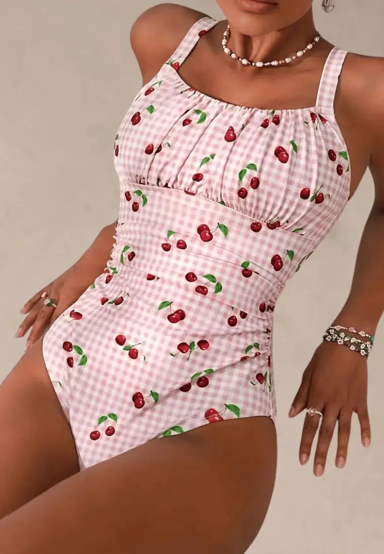 Różowy strój kąpielowy jednoczęściowy damski w kratkę z motywem wiśni