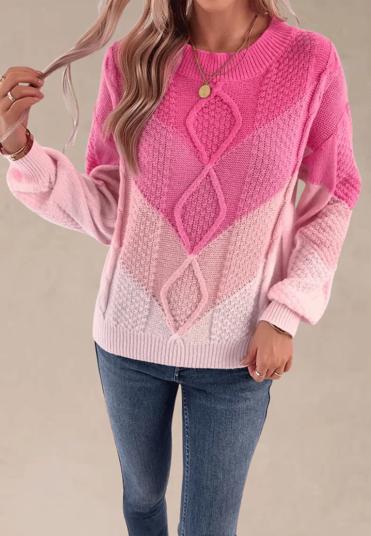 Różowy sweter damski z geometrycznym wzorem i okrągłym dekoltem