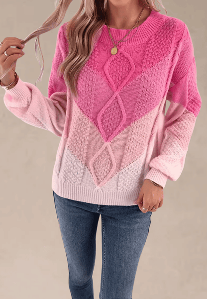 Różowy sweter damski z geometrycznym wzorem i okrągłym dekoltem