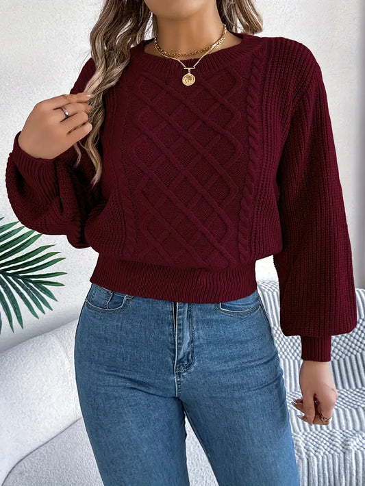 Sweter damski w kolorze burgundowym z warkoczowym splotem i luźnymi rękawami