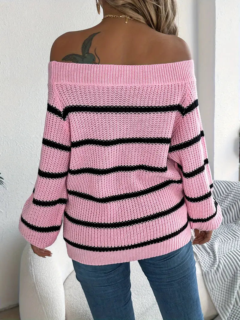 Różowy sweter w czarne paski z odkrytymi ramionami