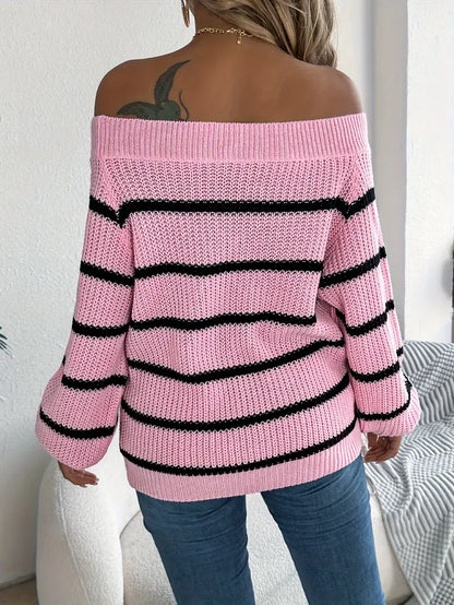 Różowy sweter w czarne paski z odkrytymi ramionami